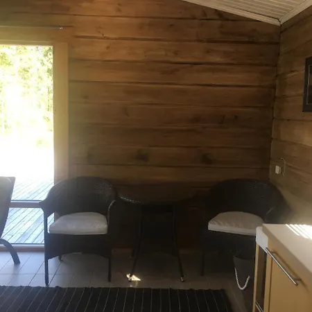 With Wood Bath At The Lake In Apartment Puumala