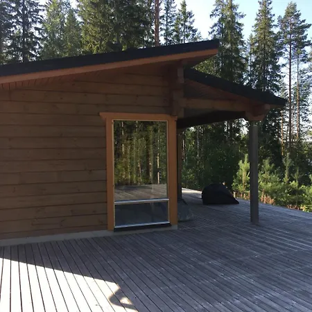 With Wood Bath At The Lake In Apartment Puumala