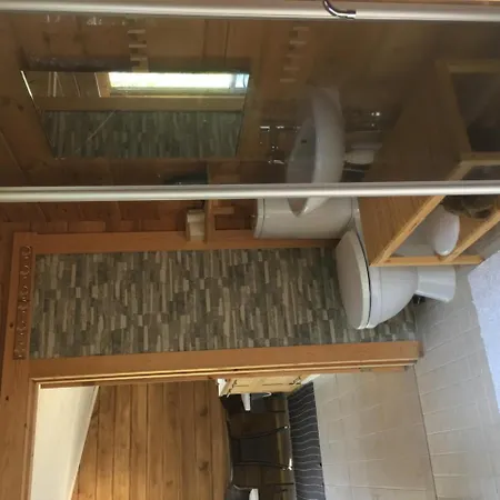 With Wood Bath At The Lake In Apartment